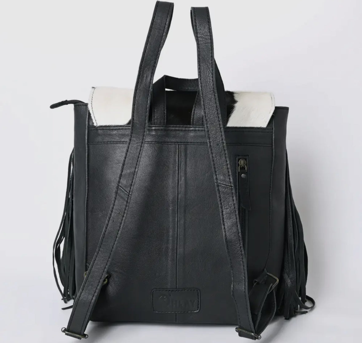 Cowhide tooled leather backpack