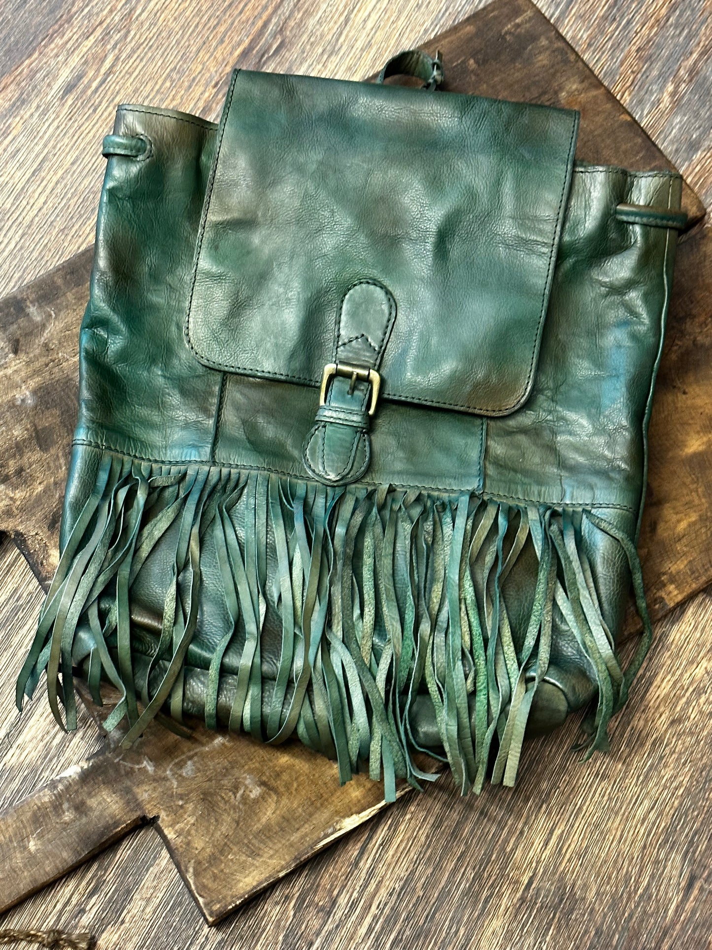 Fringe leather backpack