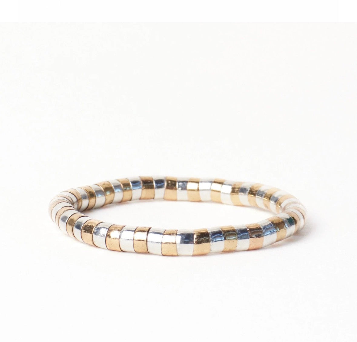 Round beaded, silver, and gold bracelet