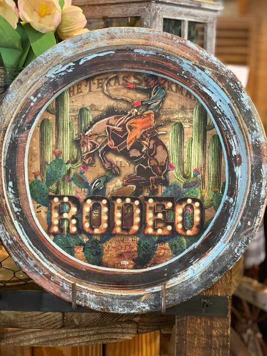 Small round wooden rodeo picture