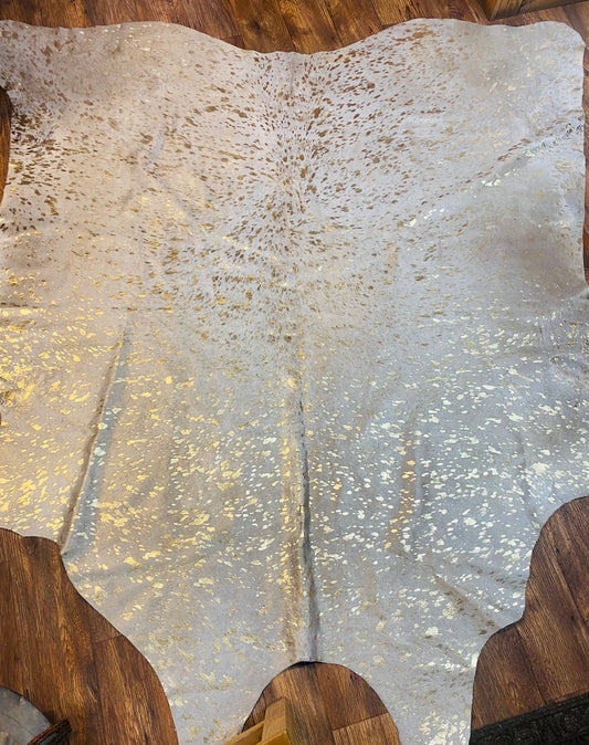 Metallic gold cowhide rug